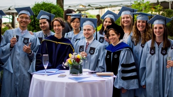Graduates around a table
